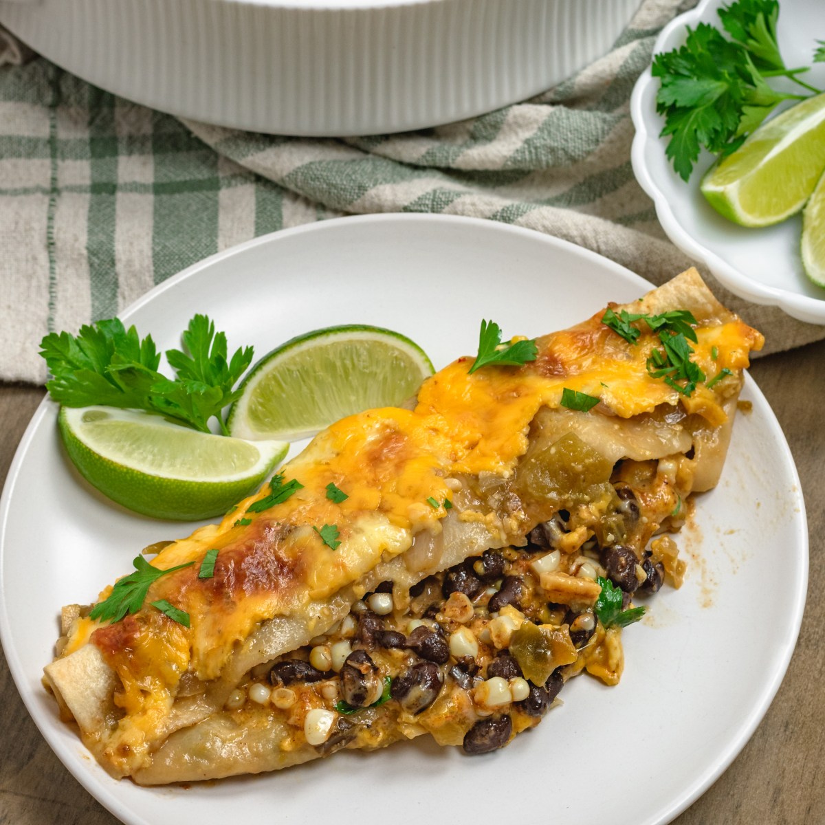 CHEESY BLACK BEAN + CORN ENCHILADAS with TOMATILLO&nbsp;SAUCE